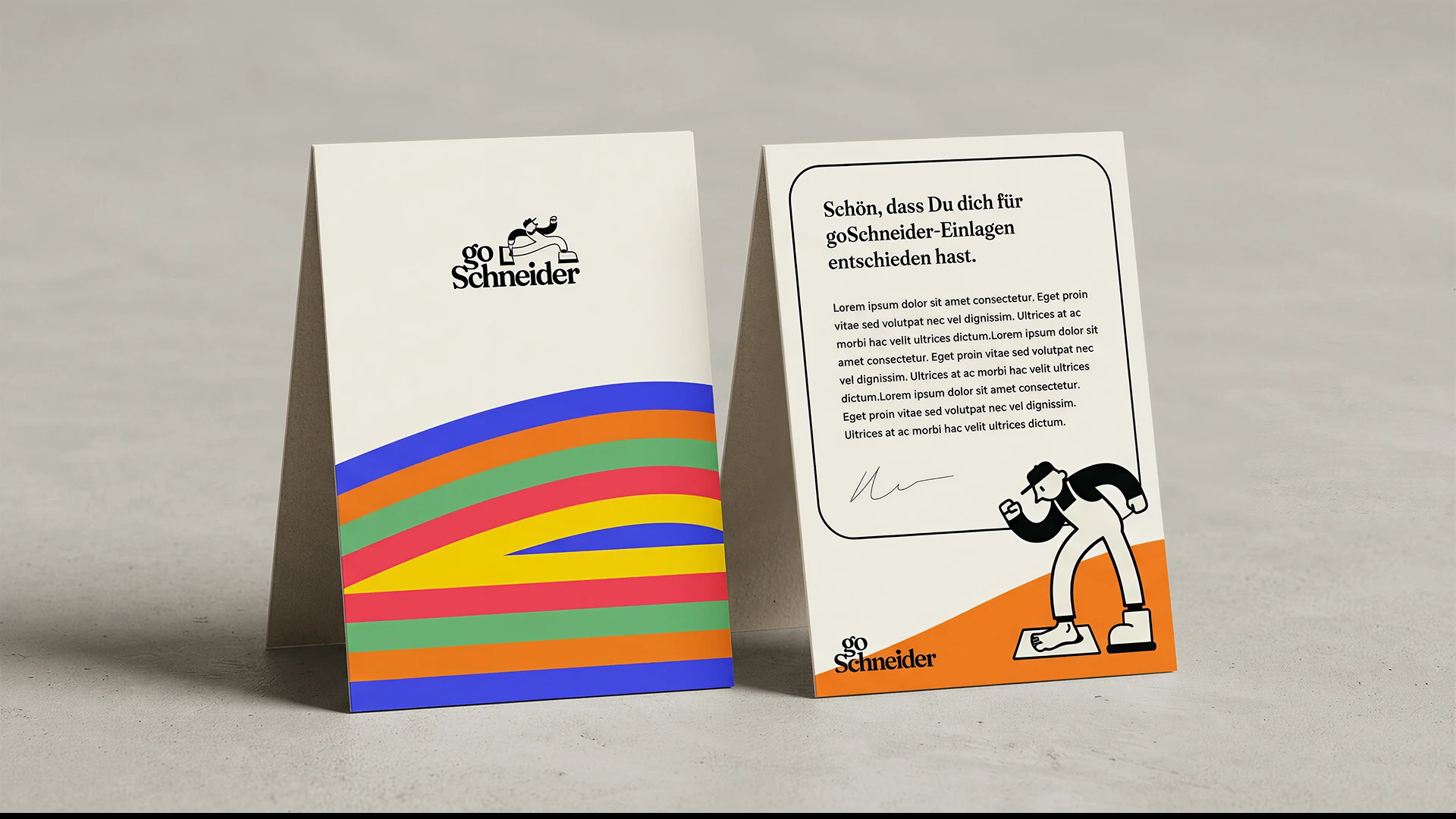 goSchneider Karte mit Regenbogen-Bodenform und Markenfigur