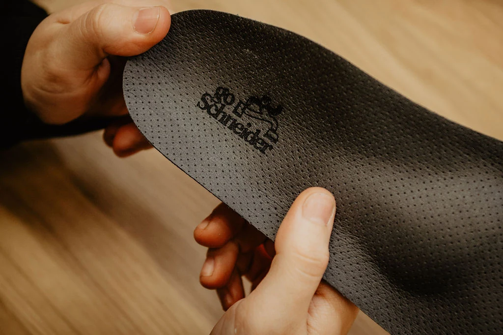 Detailaufnahme einer fertigen Einlage mit goSchneider Branding